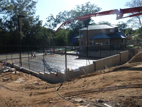 residential tennis court construction in progress